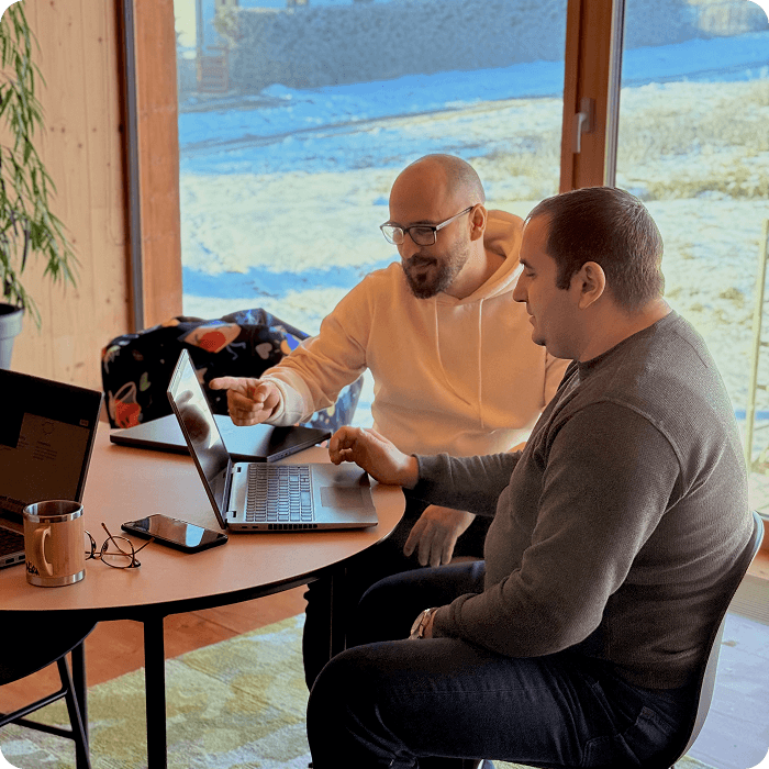 Designer and developer collaborating